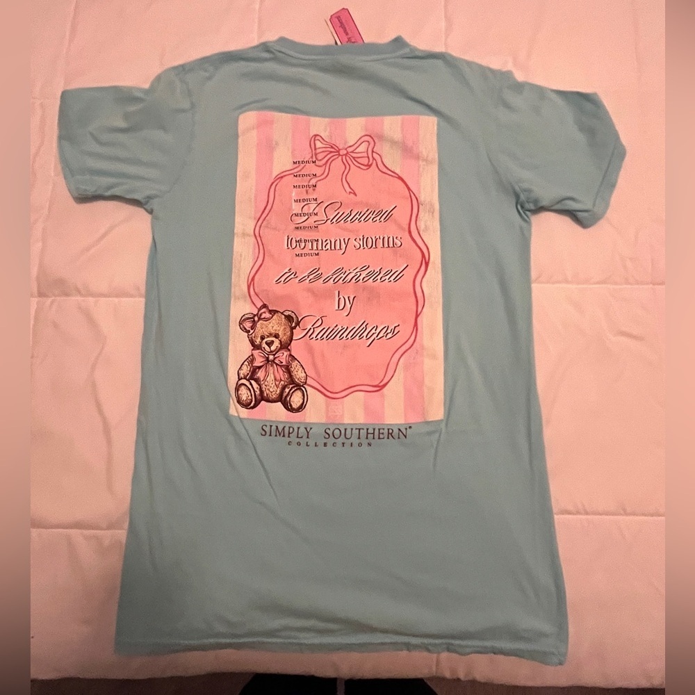 Simply Southern Light Blue Tee with Pink Graphic. Size Medium